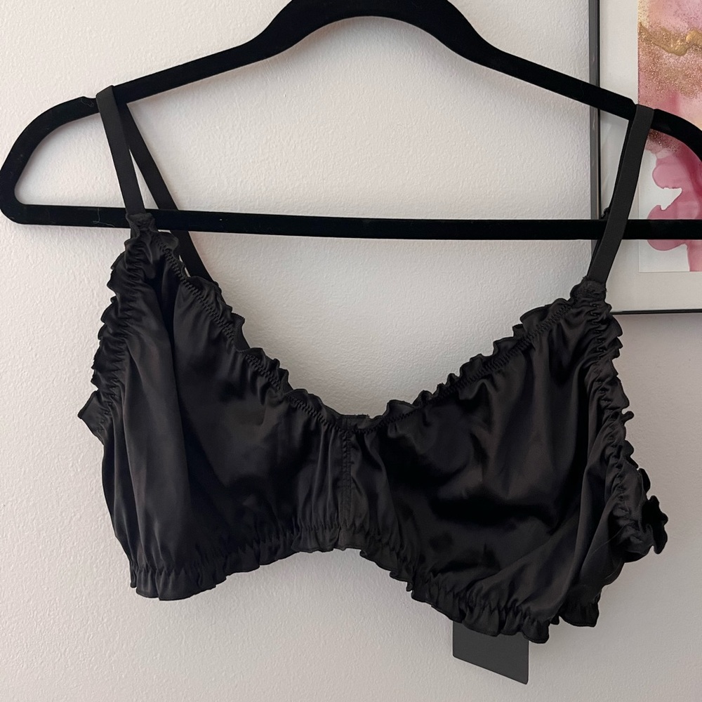 Weekday black satin bralette with adjustable straps and ruffle detailing